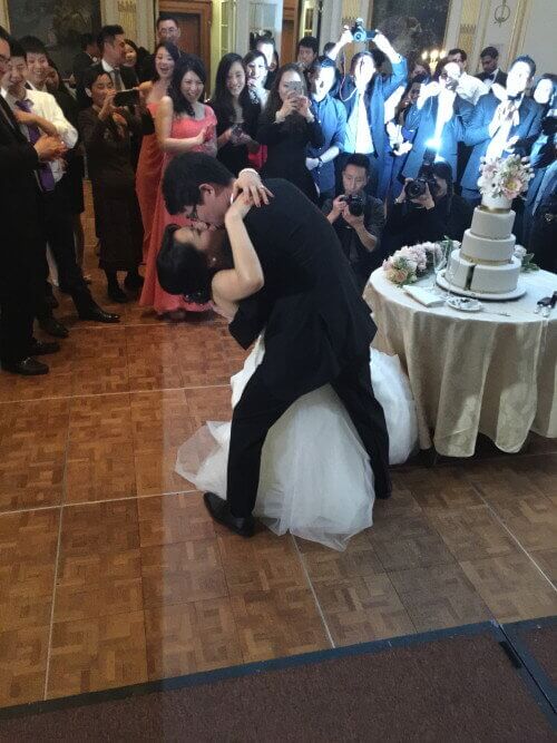 Kiss after cake cutting Best Midtown hotel Wedding