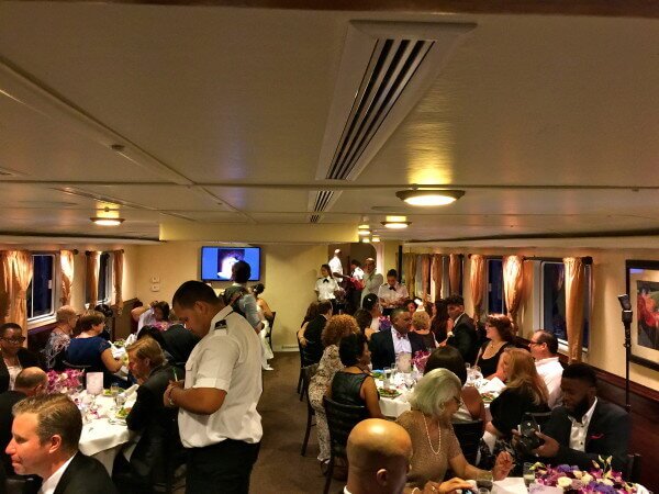 Affinity yacht wedding wedding guests having dinner on affinity Yacht