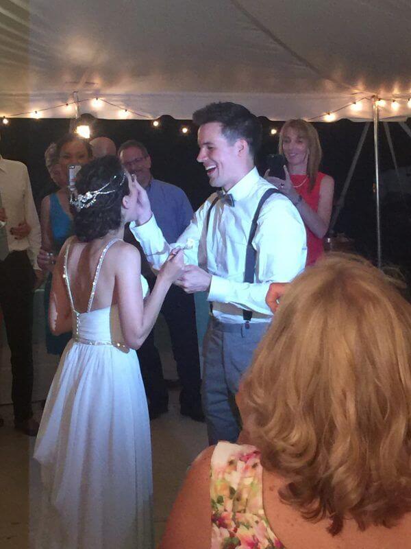 Groom feeding Bride Garrison NY Wedding