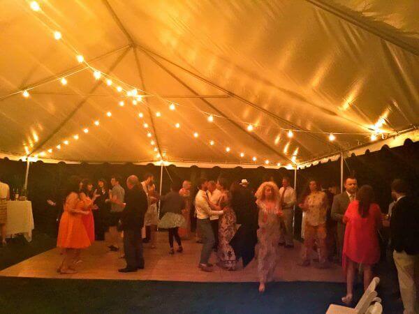 Westchester Wedding guests Dancing under Tent south salem ny lakefront