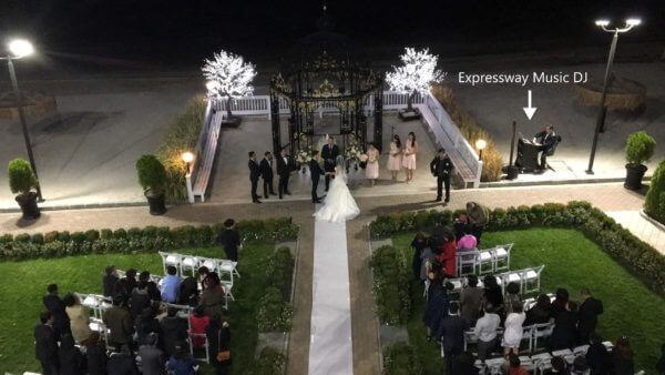Surf Club New Rochelle Wedding Balcony view of wedding ceremony facing the ocean at the Surf club in Westchester NY
