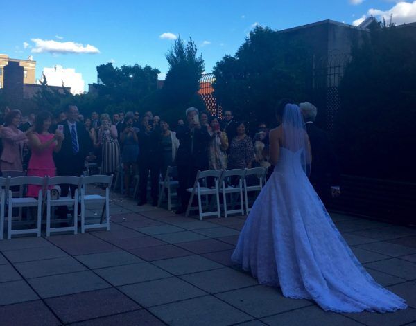 Bride walks down aisle