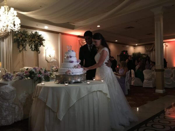Long Island Wedding DJ Bride and Groom Cut Cake