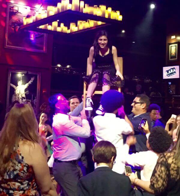 Hard Rock Cafe Bat Mitzvah Bat Mitzvah girl on chair during Hora