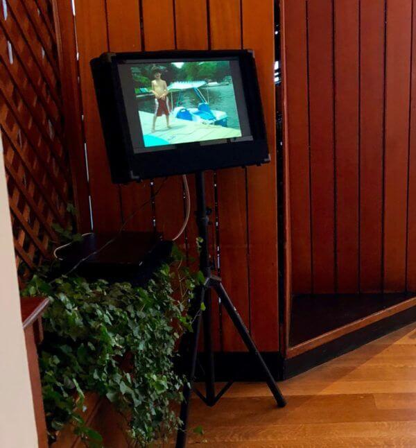 mitzvah montage on tv stand