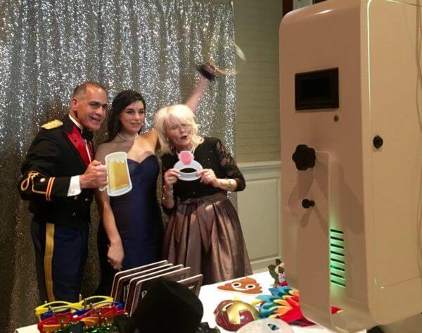 Central Park Wedding DJ and More Guests enjoying Expressway Music Photo Booth at the Boathouse in Central Park