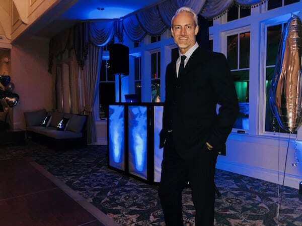 New Jersey DJ DJ Hank in front of DJ equipment