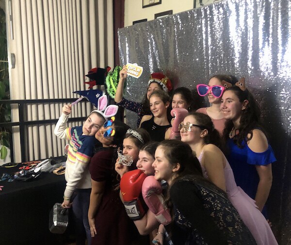 Riverdale Bat Mitzvah Bat Mitzvah girl and her friends pose for picture in our photo booth