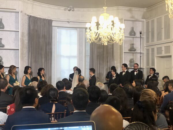 elegant wedding ceremony with Bride, Groom and Guests