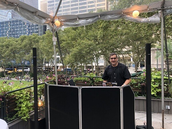 Corporate DJ Events DJ Dave and his dj set-up on Roof of Bryant Park Grill over looking Bryant Park!
