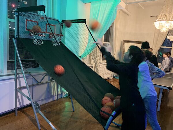 midtown loft bar mitzvah Kids playing pop a shot basketball by Expressway Music Dj's