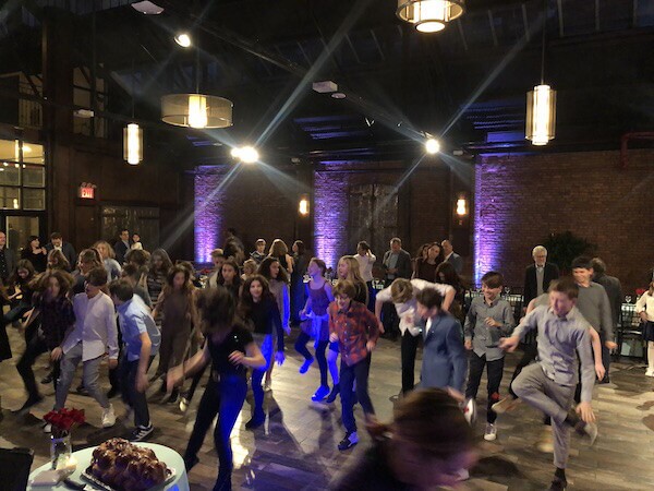 26 Bridge Bat Mitzvah Expressway Music Dancers leading Bar Mitzvah guests on the dance floor