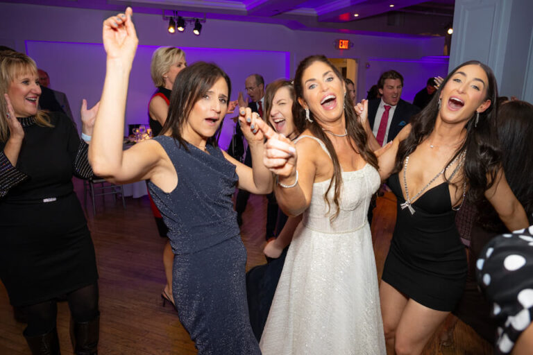 Bride and Bridesmaids having fun