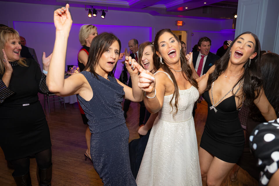 Bride and Bridesmaids having fun