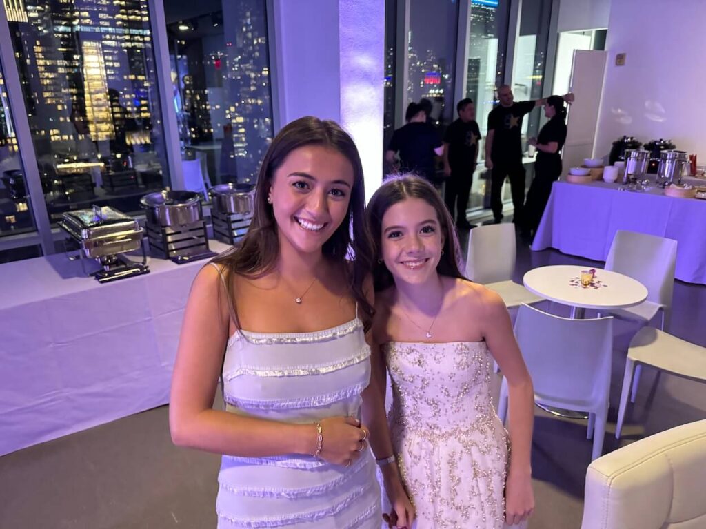 BAt Mitzvah girl with an older sister